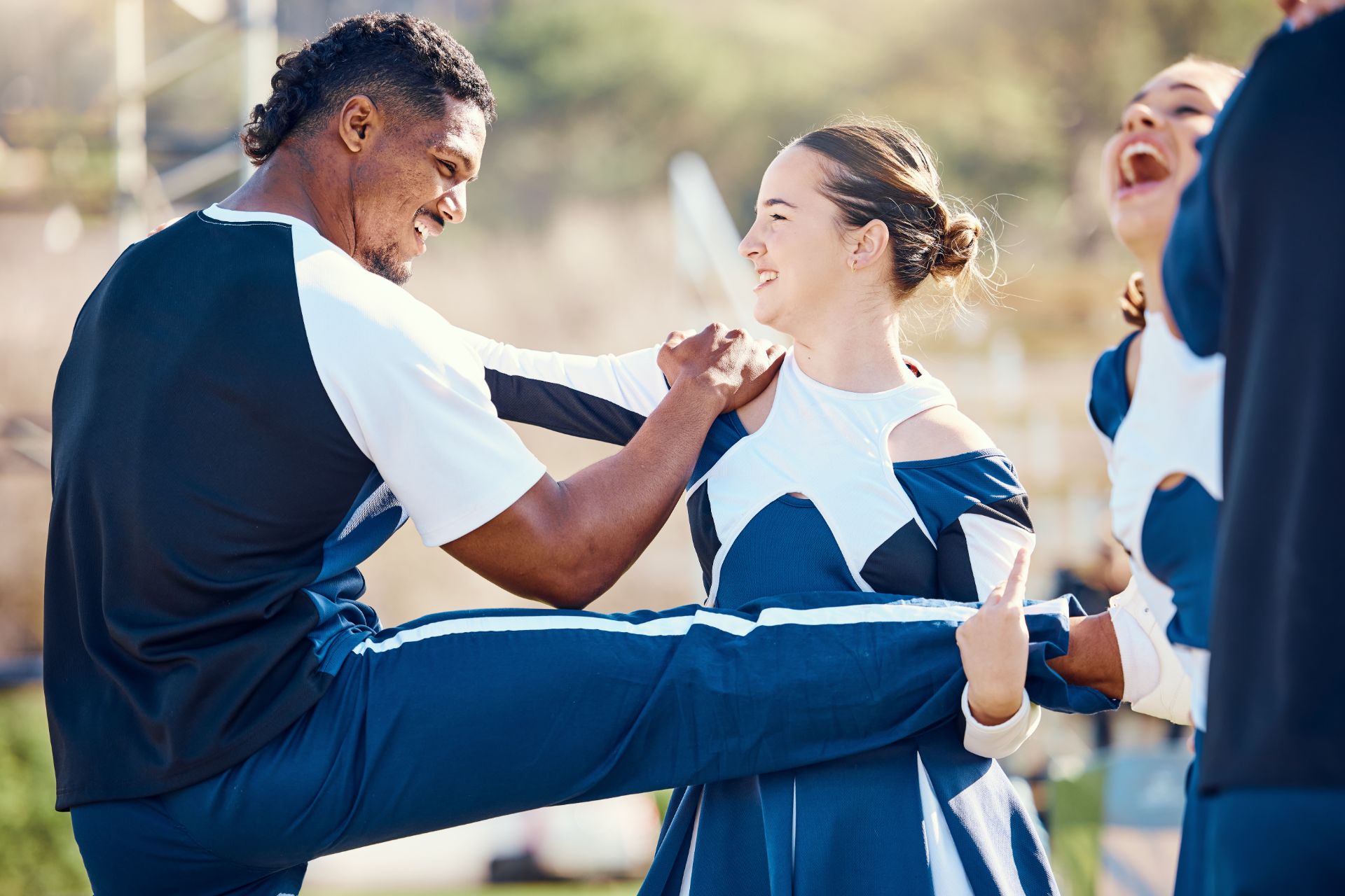 cheerleader-team-sport-and-stretching-outdoor-for-2025-04-06-08-15-20-utc (1)