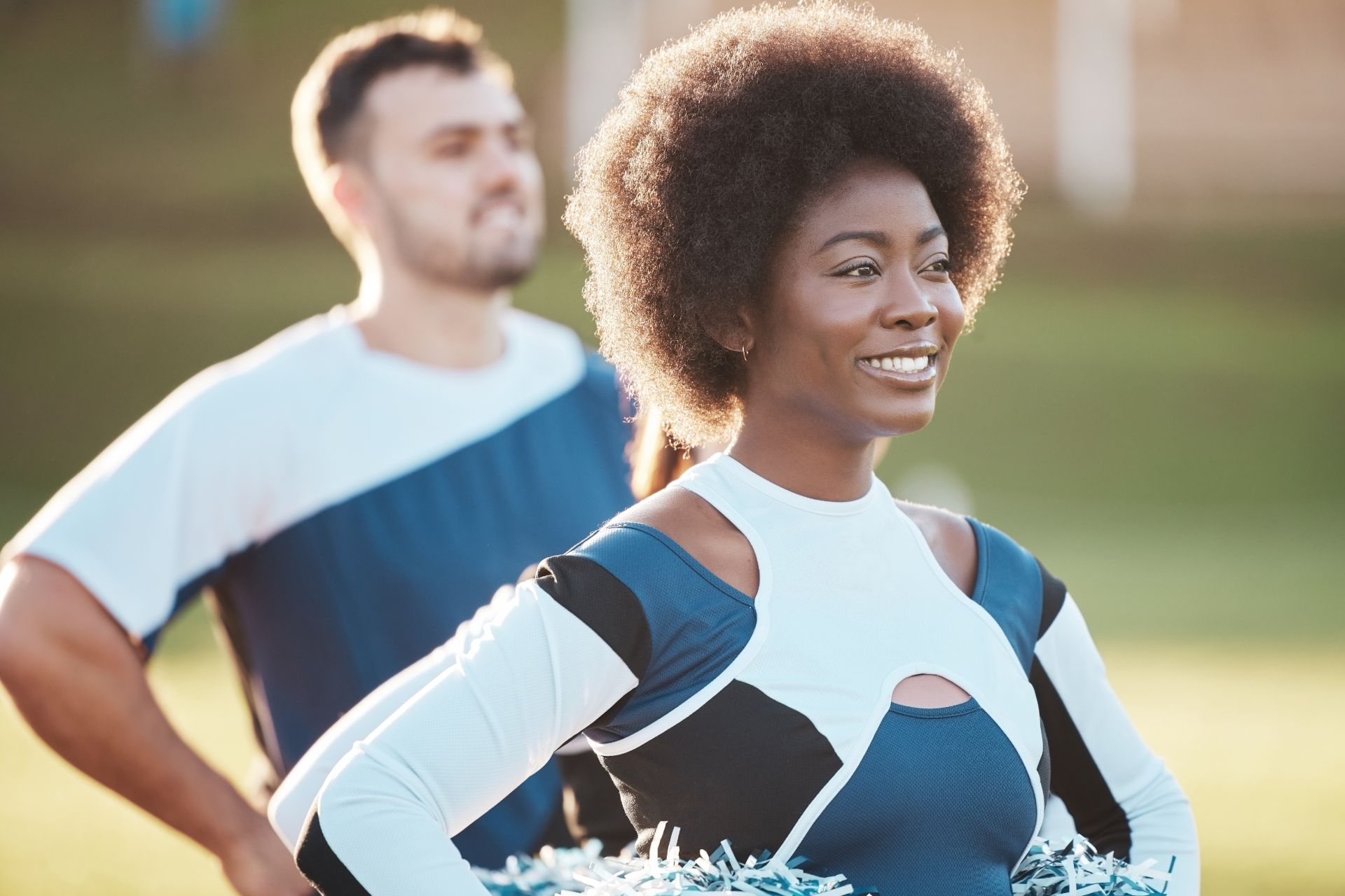 cheerleader-team-sports-and-black-woman-on-field-2025-04-06-08-23-21-utc (1)